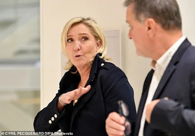 Marine Le Pen and vice president Louis Aliot pictured during a break in the closing arguments hearing of their trial on Wednesday