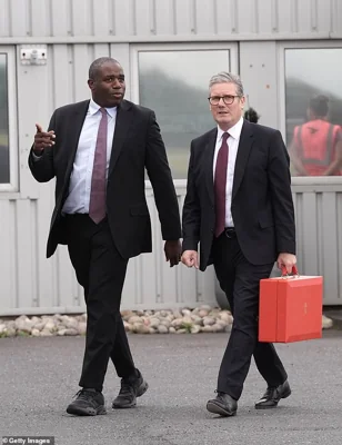 Foreign Secretary David Lammy (left) and Prime Minister Keir Starmer depart from Stansted Airport in Essex on September 12