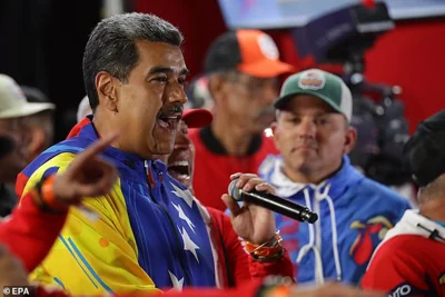 Venezuelan President Nicolas Maduro (L) delivers a speech after learning the results of the presidential elections in Caracas, Venezuela, 29 July 2024