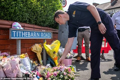 Firefighters from Merseyside joined members of the public in paying tribute to those killed and injured in the stabbings