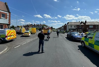 Armed police officers detained a man and seized a knife after the attack that left multiple people wounded in Southport, Merseyside