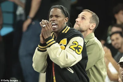 Travis Scott, Michael Rubin attend the Men's Basketball semifinals game between Team USA and Team Serbia on day thirteen of the Olympic Games Paris 2024 at Bercy Arena on August 8, 2024 in Paris, France