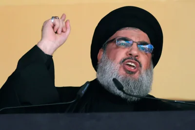 In this 24 Oct 2015 file photo, Hezbollah leader Sheik Hassan Nasrallah addresses a crowd during the holy day of Ashoura, in a southern suburb of Beirut, Lebanon