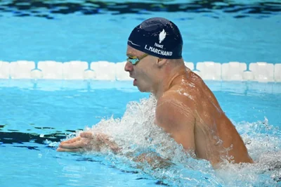 France's Leon Marchand swimming.