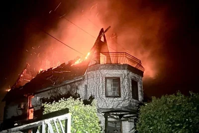 A burning building in Ukraine following another night of Russian attacks