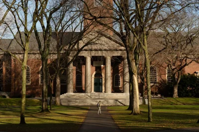 Trump Stokes Harvard Feud by Threatening Tax-Exempt Status
