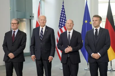 President Joe Biden shake hands with German Chancellor Olaf Scholz at the Chancellery in Berlin, Germany, Friday, Oct. 18, 2024.