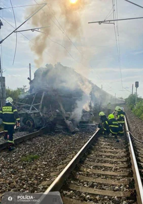 This handout photo released by the Slovak police on their facebook website on June 27, 2024 and taken near the southwestern Slovakian town of Nove Zamky shows firefighters at the site of a damaged passenger train after it collided with a bus. Five people were killed and five others injured on June 27 when a passenger train and bus collided at a railway crossing in southern Slovakia, rescuers said. The crash occurred just after 5:00 pm (1500 GMT) near the southwestern town of Nove Zamky, the CTK news agency reported. AFP PHOTO / POLICE OF THE SLOVAK REPUBLIC
