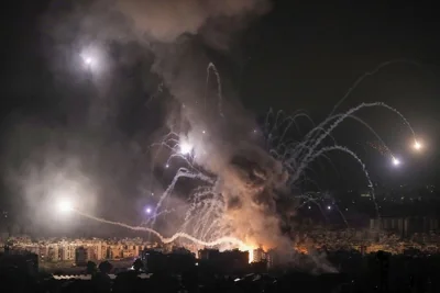 Flames and smoke rise from an Israeli airstrike in southern Beirut, October 7, 2024