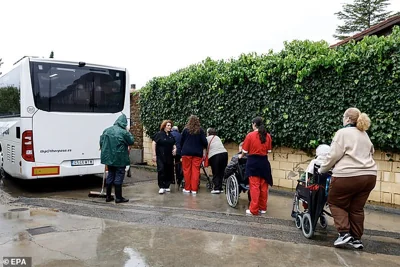 Residents of a nursing home are evacuated as Huerva river's water levels are expected to rise, in the city of Zaragoza, Spain, 30 October 2024