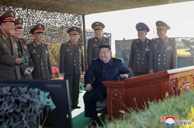 This undated picture released from North Korea's official Korean Central News Agency (KCNA) on October 6, 2024 shows North Korean leader Kim Jong Un Kim Jong Un inspecting the live artillery firing by graduates of O Jin U Artillery Academy at an undisclosed location in North Korea. AFP PHOTO/KCNA VIA KNS