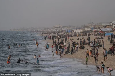 War-weary Palestinians flock to beaches and swim to take a breather among continuous Israeli attacks in Rafah