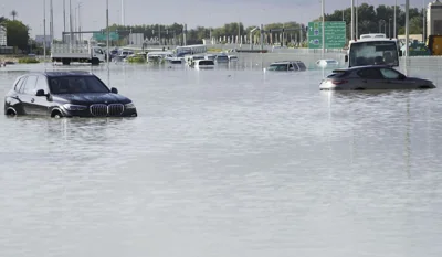 Storm dumps record rain across the desert nation of UAE and floods the Dubai airport