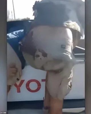 In the horrifying footage, Hersh is seen climbing into the bed of a Hamas pickup truck moments after his left arm was blown off
