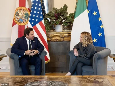 A handout photo made available by the Chigi palace Press Office shows Italian Prime Minister Giorgia Meloni (R) with Florida Governor, Ron DeSantis (L), during their meeting at the Chigi Palace in Rome, Italy. DeSantis has some big political decisions awaiting him when he returns