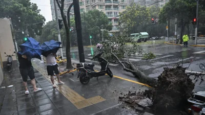 Typhoon Bebinca lashes Shanghai in strongest storm to hit city since 1949