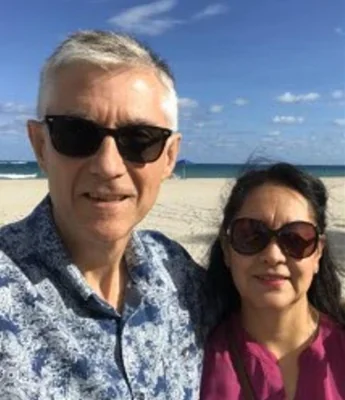 Greg Woodfield (pictured with his wife Luz Stella) at first believed they could ride out the storm at their Florida home - before the predictions got worse and worse