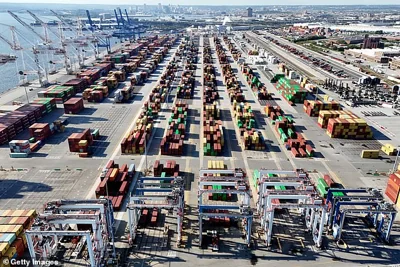 Dozens of cargo ships lined up offshore to distribute their goods at American ports amid the strike