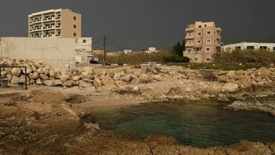 A building, left, in Batroun where Lebanese officials say a ship captain was taken away by a group of armed men, 2 November, 2024