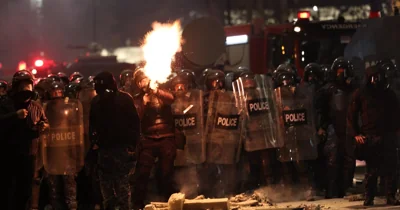 Georgian protesters clash with police after EU talks were frozen