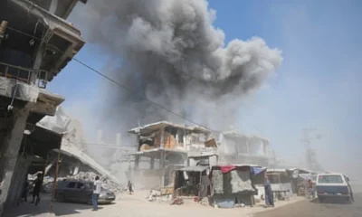 Smoke rises from buildings in Khan Younis after an Israeli airstrike