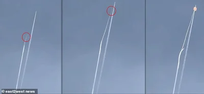 Two unidentified aircraft were seen soaring above Ukraine's embattled Donetsk region earlier this month when one suddenly released a missile, blasting the other out of the sky in a violent explosion that was caught on camera