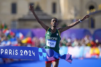 Ethiopian Tamirat Tola wins men's marathon to end Kenya dominance