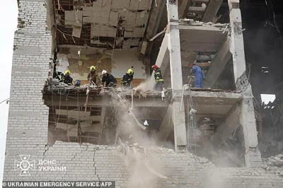 This handout picture taken and released by Ukrainian emergency service on September 5, 2024 shows Ukrainian rescuers working in a military educational facility which was hit by missiles in Poltava, eastern Ukraine on September 3, 2024