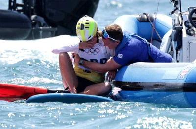 Emma Wilson is consoled after finishing a controversial third in the women’s windsurfing event in Marseille (Patrick Aventurier/PA)