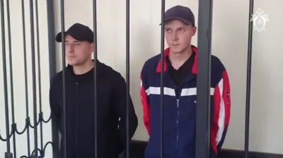 Окупанти "засудили" двох бійців "Азову" до понад 20 років ув'язнення