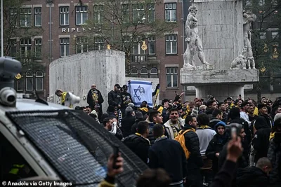 Fans of Maccabi Tel Aviv stage a pro-Israel demonstration at the Dam Square, lighting up flares and chanting slogans ahead of the UEFA Europa League match