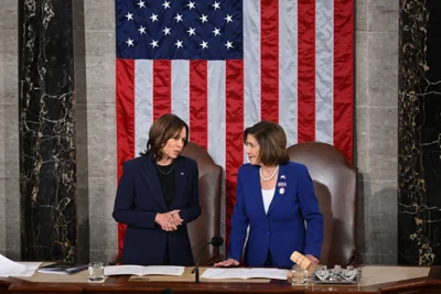Nancy Pelosi (right) was notably absent from the list of high profile Democrats who threw their support behind her on Sunday, following the announcement that Joe Biden would be ending his reelection campaign