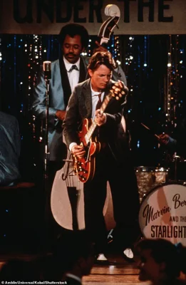 Chris previously spoke about how seeing Michael on guitar playing Johnny B. Goode in one iconic scene from 1985's Back To The Future (pictured) was his inspiration to become a musician.