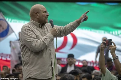 Conservative Iranian parliament Speaker Mohammad Bagher Qalibaf, a candidate for the June 28 presidential election, addresses a rally June 26, 2024 in Tehran