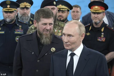 Russian President Vladimir Putin, accompanied by Head of the Chechen Republic Ramzan Kadyrov