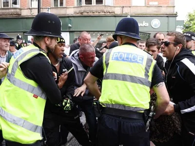 Protesters and counter-protestors scuffle in Nottingham