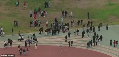 Concerned locals gathered in a public space as they felt the quake