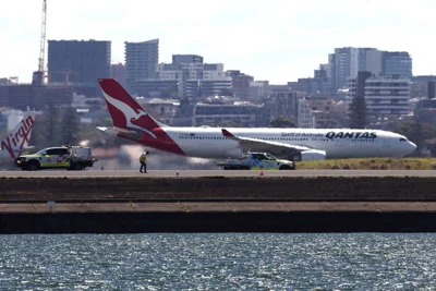 Qantas plane returns to Australia airport due to 'engine failure,' sparks fire