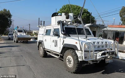 UN peacekeepers (UNIFIL) vehicles drive in Marjayoun, near the border with Israel, amid ongoing hostilities between Hezbollah and Israeli forces, southern Lebanon October 11