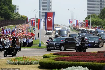 A convoy transports North Korea's leader Kim Jong Un and and Russian President Vladimir Putin during a welcoming ceremony at Kim Il Sung Square in Pyongyang on June 19, 2024