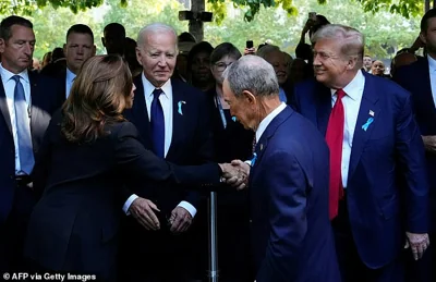 Vice President Kamala Harris (left) shakes hands with former President Donald  Trump (right) as former Mayor of New York Michael Bloomberg (center) and President Joe Biden (second-left) look on