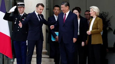 French President Emmanuel Macron and European Commission President Ursula von der Leyen accompany China's President Xi Jinping