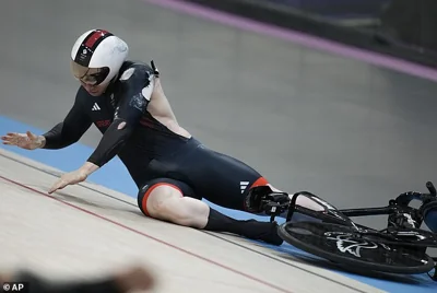 Team GB star Jack Carlin is treated by medics after horror 30pm crash denies him chance of Olympic medal in the latest accident involving British riders