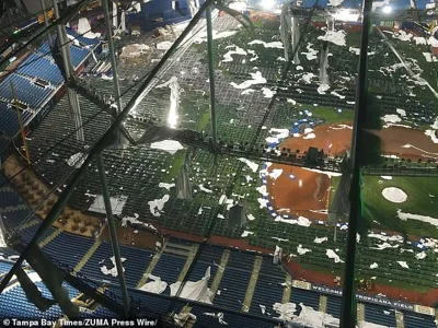 Whole panels have been blown off the top of the MLB stadium by the monster storm