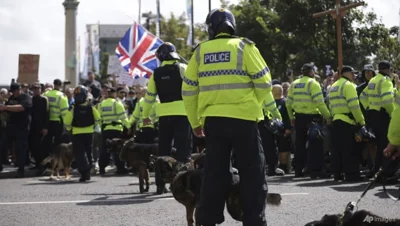 Far-right protesters clash with police as UK unrest spreads
