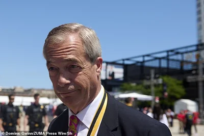 Outspoken right-wing MP Nigel Farage (pictured) took to X to gloat over Biden dropping out
