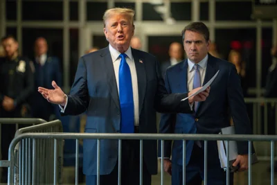 Donald Trump and his attorney Todd Blanche appear in a criminal courthouse in Manhattan on May 30. He has repeatedly failed to completely overturn a gag order restricting his public attacks against prosecutors, court staff, witnesses and jurors.