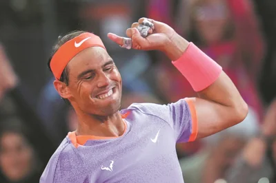 Rafa takes a second to celebrate at Madrid Open