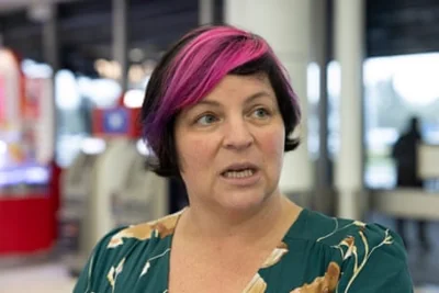 Ayelet Nussbaum waits for her niece and nephew to arrive on the first Australian repatriation flight from Israel on 17 October 2023