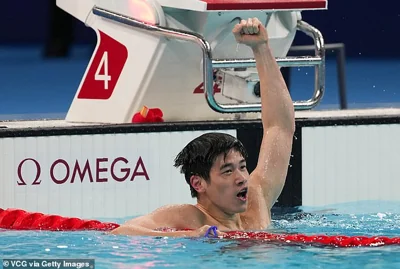 Pan Zhanle celebrates after smashing his own world record in the Paris Olympics to take gold in the 100m freestyle final